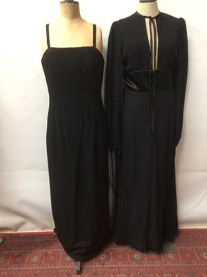 Lot 2220 - 1970's Black crepe maxi dress with spilt front bodice and back, black satin waist panel and gathered sleeves with ties.  Similar date black crepe square neck sleeveless maxi and a 1960's black bead...