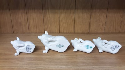 Lot 174 - Eighteen Belleek fine bone China animals and figures to include Elephant, Owls, Pigs Cats etc