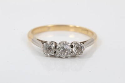 Lot 105 - 18ct gold diamond three stone ring with three old cut diamonds in platinum claw setting