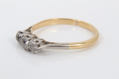 Lot 105 - 18ct gold diamond three stone ring with three old cut diamonds in platinum claw setting