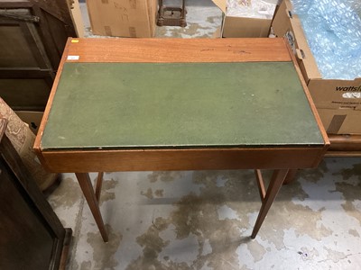 Lot 887 - 1960s mahogany desk with leather lined top, drawer below on taper legs 84 cm