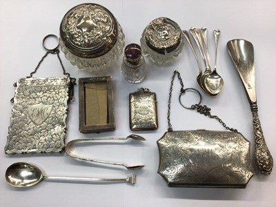 Lot 676 - Small group of antique silver items to include a Victorian silver card case by George Unite, Victorian silver Vesta case, silver evening bag/purse, silver topped smelling salts bottle and toiletry...