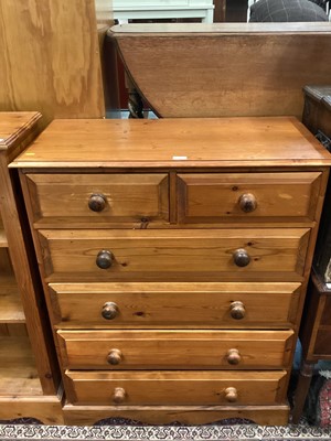 Lot 902 - Two pine chest of drawers together with a pine bedside cabinet