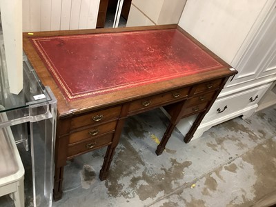 Lot 925 - Edwardian Edwards and Roberts desk with leather lined top, seven drawers on pillar supports  122 cm wide