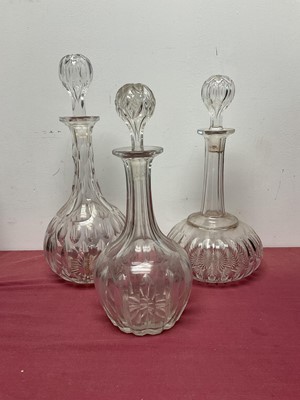 Lot 434 - Three Edwardian cut glass decanters