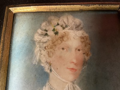 Lot 136 - Regency portrait miniature on ivory and two printed miniatures