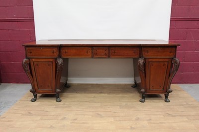 Lot 1430 - Impressive Regency mahogany breakfront twin pedestal sideboard with ebony 
and line inlaid decoration, carved scroll supports, on paw feet