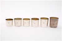 Lot 557 - Rare set of six George III graduated beakers...