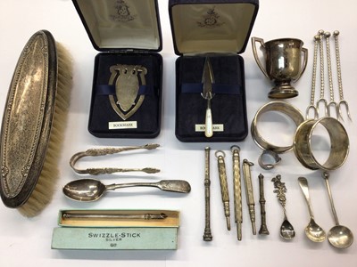 Lot 678 - Two novelty silver bookmarks, two silver napkin rings, silver backed brush, various propelling pencils, silver salt spoons and some plated items