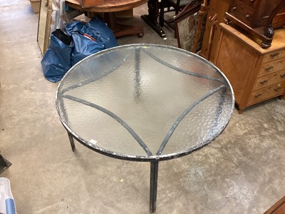 Lot 936 - Circular metal framed table with glass top, 121cm diameter, 64cm high