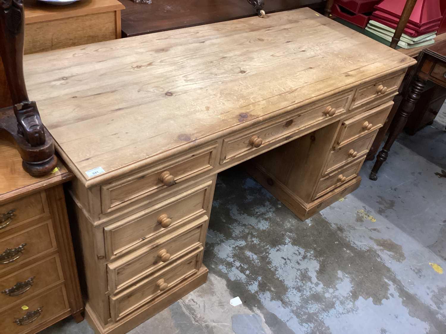 Lot 941 - Pine kneehole desk with nine drawers below, 152cm wide, 64cm deep, 76.5cm high