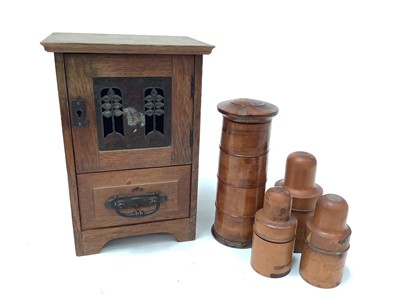 Lot 2594 - Edwardian oak smokers cabinet, together with three sycamore medicine bottle holders and a spice tower