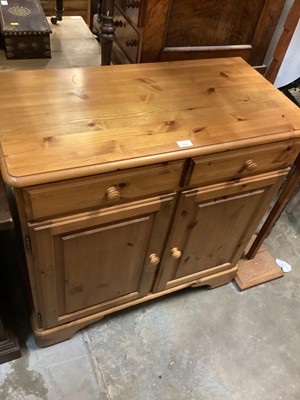 Lot 952 - Ducal pine unit with two drawers and cupboards below, 90cm wide, 44.5cm deep, 88cm high