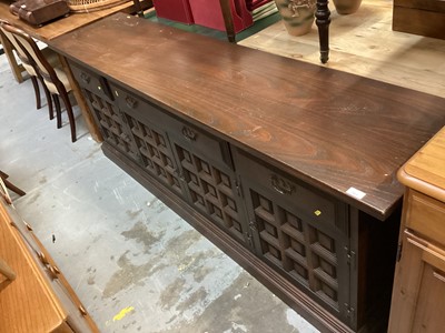 Lot 953 - Old Charm style long oak sideboard with three drawers and four panelled doors below, 207cm wide, 48cm deep, 77cm high