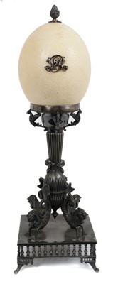 Lot 843 - 19th century silver plated table center with mounted ostrich egg