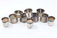 Lot 566 - Seven Silverer napkin rings - various and...