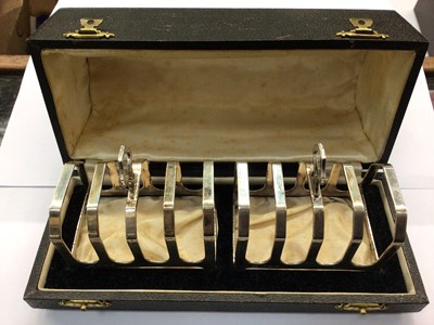 Lot 731 - Pair silver toast racks (Birmingham 1937) in fitted box