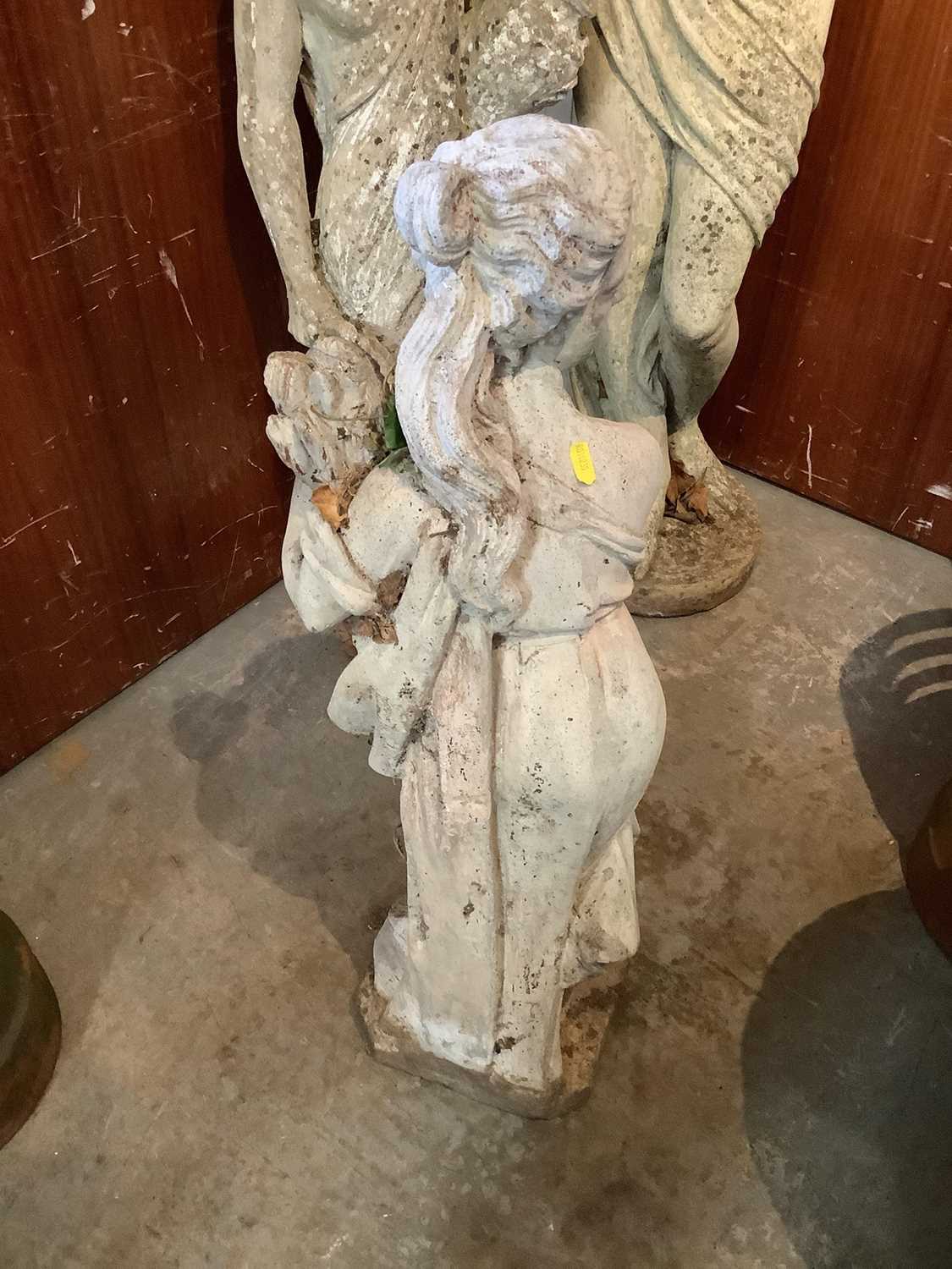 Lot 1043 Concrete garden statue of a female, 91cm