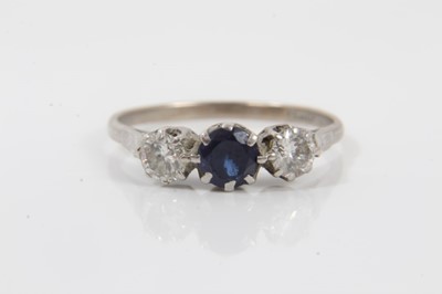 Lot 222 - Platinum diamond and sapphire three stone ring
