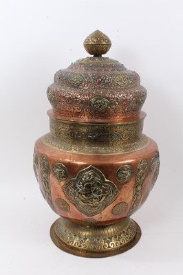 Lot 886 - Large antique Tibetan brass and copper vessel