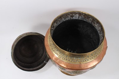 Lot 886 - Large antique Tibetan brass and copper vessel