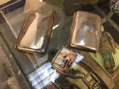 Lot 773 - Two silver cigarette cases together with a contemporary silver pill box (3)