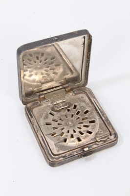 Lot 246 - Silver powder compact of square form with inlaid black onyx lid (London 1914)