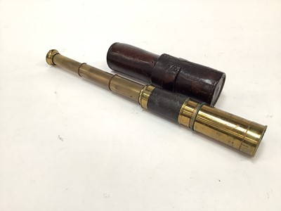 Lot 2592 - Lacquered brass three draw scope in leather case