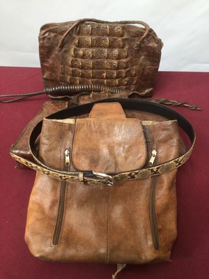 Lot 2239 - Two Aligator skin bags and Veritable leather bag, snake skin belt and a whip.