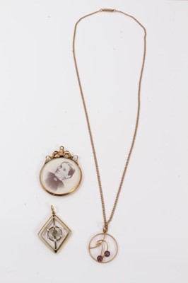 Lot 257 - Three Edwardian gold pendants