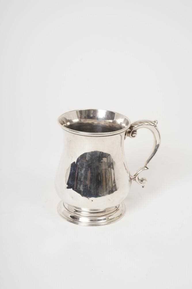 Lot 281 - George II silver mug of baluster form Richard Bayley. London 1741.