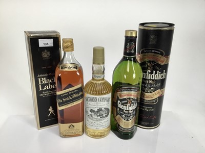 Lot 135 - Whisky - two bottles, Johnnie Walker Black Label and Glenfiddich, both litre bottles, in original boxes, together with a bottle of Southern Comfort (3)
