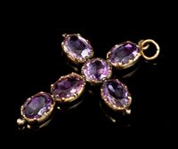 Lot 609 - Regency amethyst cross pendant with six mixed...