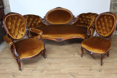 Lot 1393 - Matched suite of mid Victorian button upholstered mahogany furniture to include settee