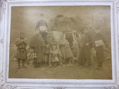 Lot 1469 - Victorian Photograph North Norway Indigenous People outside a sod house with group of uniformed men.  Photographer J H Wennberg, Tromso, Norway.