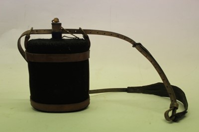 Lot 711 - First World War British military cloth covered field water bottle, with brown leather strap dated 1917, together with a collection of wooden barrels constructed from the timber of Warships and grou...