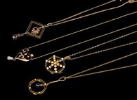 Lot 614 - Four Edwardian gold and gem set pendant...