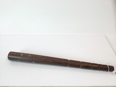 Lot 909 - 19th century turned wood club / truncheon of tapered form, the head set with smoothed nails and engraved 'Belfast 1886', possibly used during the Belfast Riots of 1886, 42.5cm in overall length.