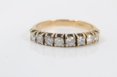 Lot 342 - 14ct gold diamond eight stone half eternity ring