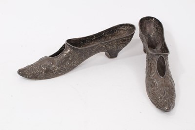 Lot 863 - Pair of late Victorian silver shoe form pin cushions