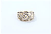 Lot 778 - Gold (14ct) diamond dress ring, the wide band...