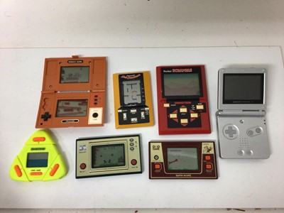 Lot 1851 - Vintage Nintendo games and other games including Game and Watch Donkey Kong and Fire, Pocket Scramble, Mini-Munchman ,.....