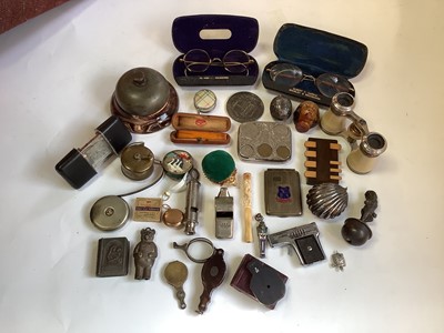 Lot 2613 - A group of antique and later collectables, including novelty tape measures, opera glasses, trinket boxes, whistles, spectacles, cheroot holders, etc