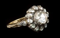 Lot 629 - Georgian-style diamond cluster ring, the...