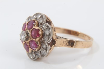Lot 203 - Ruby and diamond flower head cluster ring