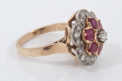 Lot 203 - Ruby and diamond flower head cluster ring