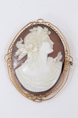 Lot 100 - 19th century carved shell cameo in yellow metal brooch mount, four silver brooches, others and collection of vintage cameo scarf clips, within a jewellery box