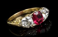 Lot 632 - Fine ruby and diamond three stone ring, the...