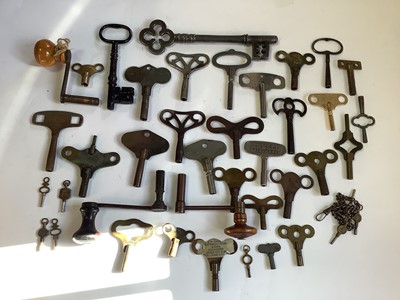 Lot 2624 - Group of antique and later keys, including a good quality steel example with quatrefoil handle