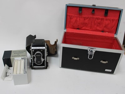 Lot 2459 - Mamiya C3 twin lens reflex camera in case, with single exposure attachment, in hard carry case